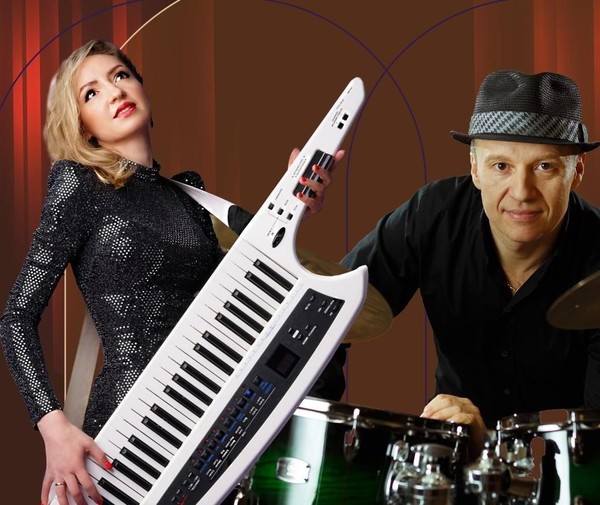 Олег и Наталья Бутманы и концертный духовой оркестр им. Осиновского Д.А