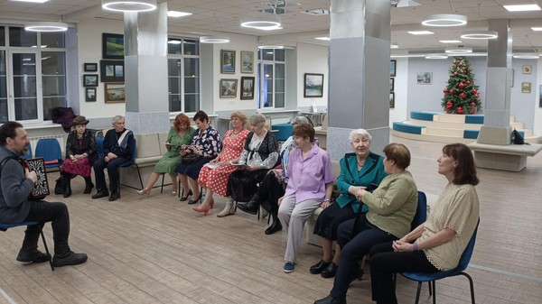 Исполнение песен под гармонь «За окошком снег кружится…»