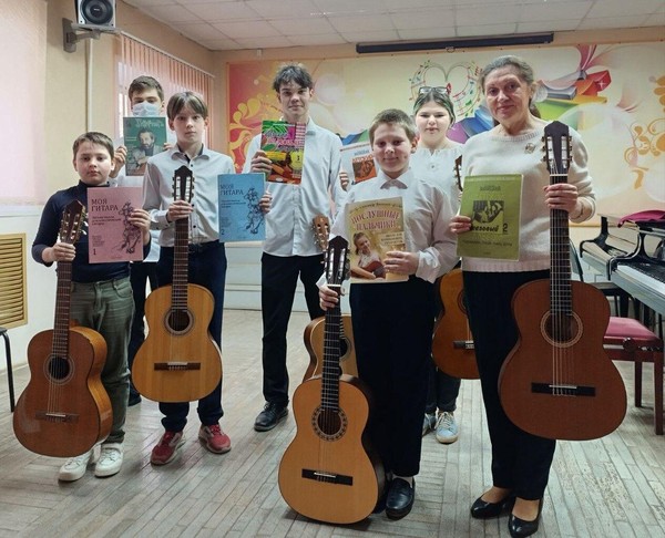 Начальное обучение на классической гитаре