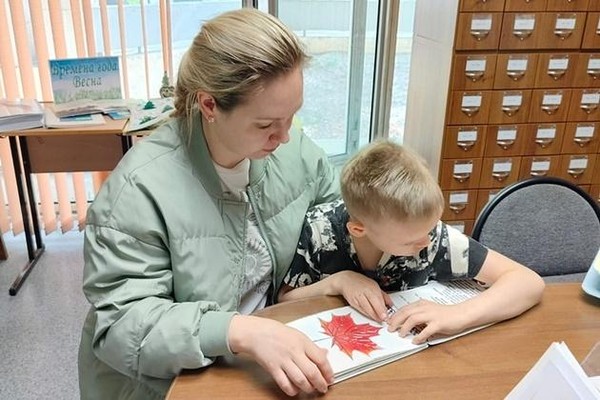 Акция «Минуты с книгой: фотопортрет читателя»